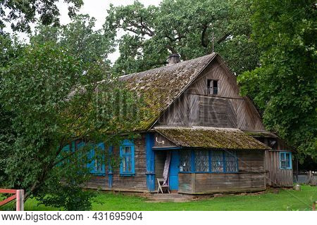 Old Traditional Wooden House And Yard