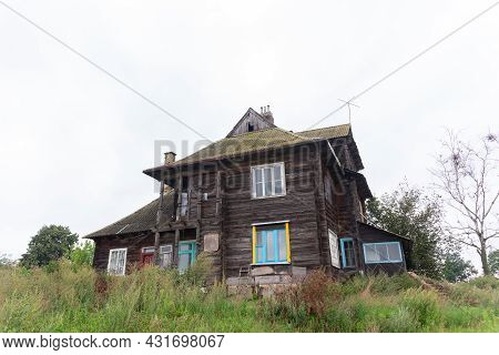 An Old Abandoned Three-storey Fully Wooden House