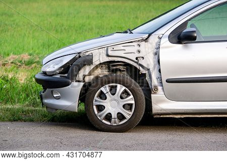 Ostrava, Czech Republic - July 12, 2021: A Detail Of A Frontal Part Of Silver Peugeot 206 Car Damage