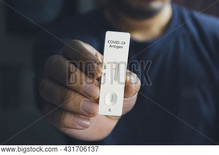 Own Hand Showing Covid-19 Negative Test Result With Sars Cov-2 Rapid Antigen Test Kit (atk),coronavi