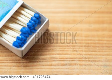 Wooden Safety Matchsticks Stacked In Cardboard Matchbox On Old Wooden Background.box Of Matches.wood