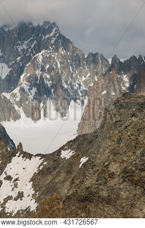 Big Massif Of Monte Bianco Covered By Dark Clouds In The Summer Season