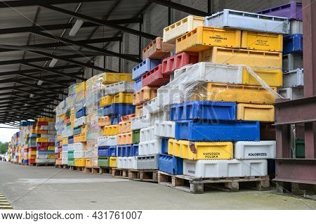Sassnitz, Germany, August 20, 2020: Colorful Plastic Boxes With Fresh Fish Delivered From Different 