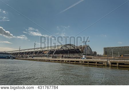 Amsterdam, Netherlands - August 15, 2021: Half Circle Glass Covering Over Railway Tracks At Centraal
