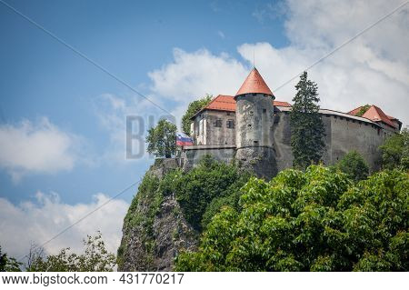 Selective Blur On The Bled Castle, Also Called Blejski Hrad, During Summer, Surrounded By The Trees 