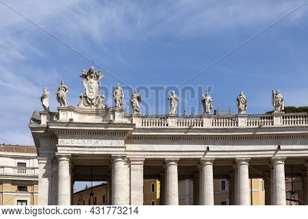 View To The Colonnades At St. Peter's Square In The Vatican, Rome, Italy With Inscription Alexan - E