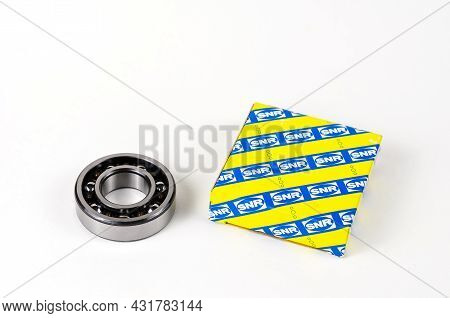 New Ball Bearing And Square Paper Box On White Background. Auto Part Manufactured By Ntn Snr. The Co