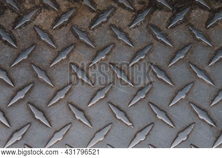 Heavily Used Stainless Steel Step With Pattern