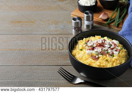 Delicious Traditional Banosh Served On Wooden Table. Space For Text