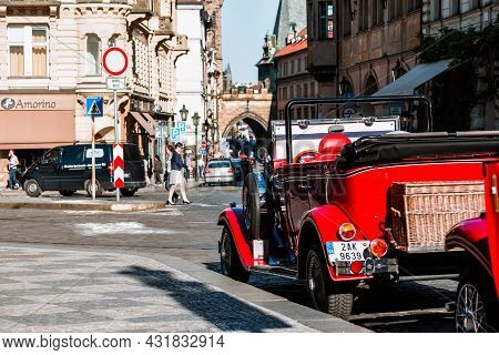 Prague, Czech Republic - May 25, 2017: Red Vintage Sightseeing Oldtimer With Parked At Lesser Town S