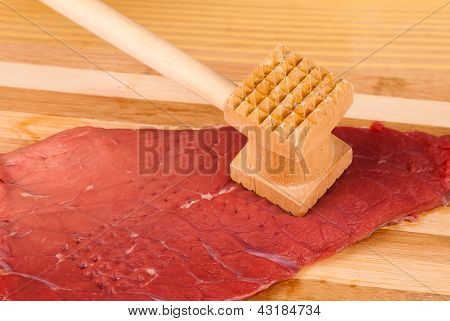Tenderizing kød