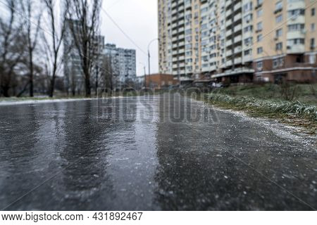 Slippery Road Covered Ice. Frozen Winter Way After Freezing Rain