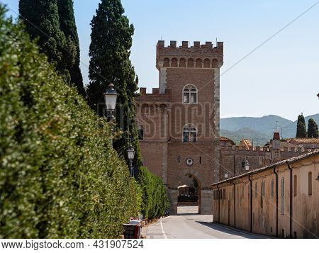 Embattled Tower Of The Medieval Castle At The Entrance To The Village Of Bolgheri.