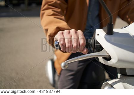 Close-up Of The Motorcyclists Hand. The Concept Of Speed, Movement, Forward Motion, Acceleration, Tr