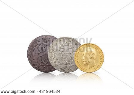 Numismatics. Old Collectible Coins Of Silver, Gold And Copper. Isolated White Background.
