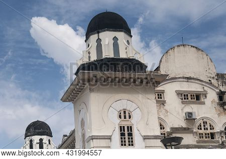 Old Colonial Buildings Located In The Laluan Koloni Area Of Kuala Lumpur Malaysia On A Sunny Blue Sk