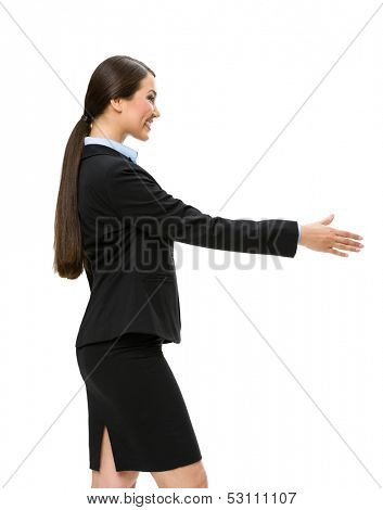 Half-length profile of businesswoman handshake gesturing, isolated on white. Concept of leadership and cooperation