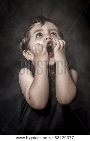 Act, child rocker dress and funny expressions crested