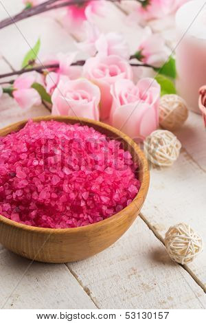 Sea Salt In Bowl With Candle  On Wooden Background