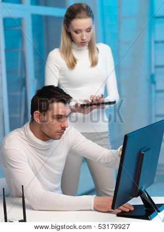 business, internet, technology, computers, science communication concept - woman and man with computer in the lab