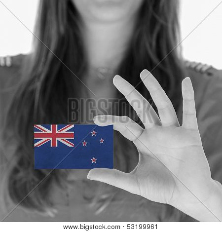 Woman Showing A Business Card