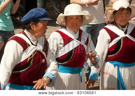 Chinese Naxi Old Woman Performing A Dance.