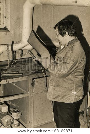 LODZ, POLAND, CIRCA 1950's: Vintage photo of welder working