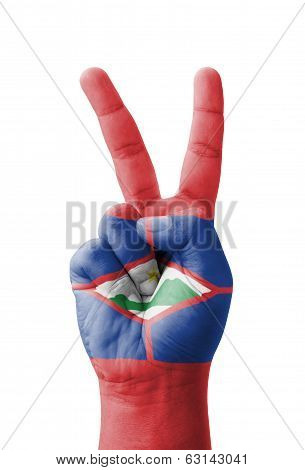 Hand Making The V Sign, Saint Eustatius Flag Painted As Symbol Of Victory, Win, Success - Isolated O