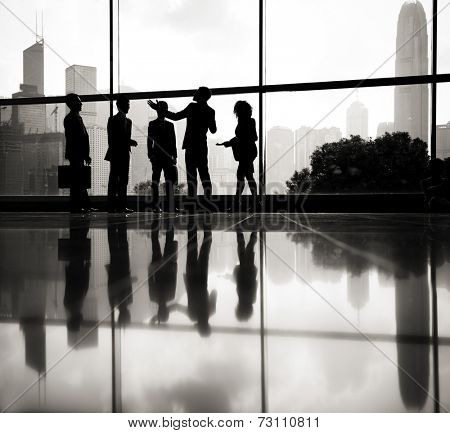 Businessman talking to his co-workers.