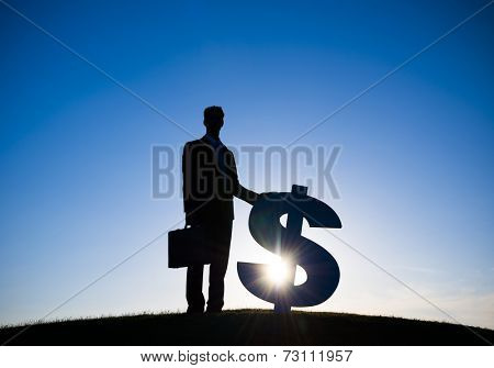 Businessman holding Dollar sign