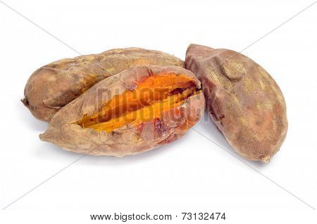 some roasted sweet potatoes on a white background