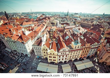 Houses with traditional red roofs in Prague Old Town Square in the Czech Republic