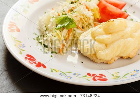 chicken schnitzer with salad