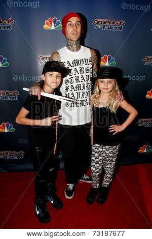 NEW YORK-SEP 17: Drummer Travis Barker (C),son Landon & daughter Alabama attend America's Got Talent: The Finale Season 9 post-show at Radio City Music Hall on September 17, 2014 in New York City.