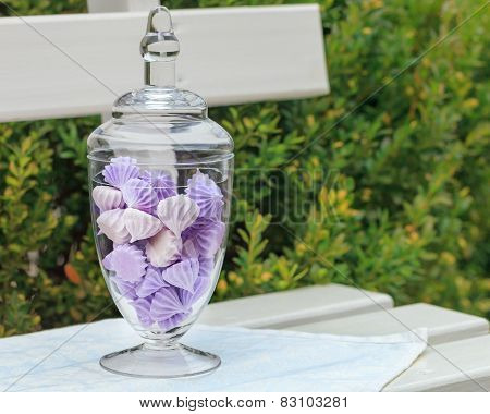 Marshmallow in a glass bowl on vivid background