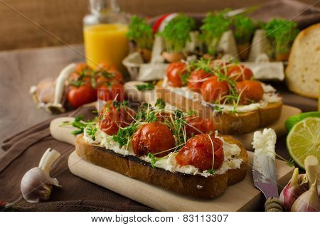 Roasted Cherry Tomato Sauce And Ricotta On Toast