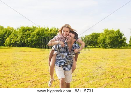 Youth Lifestyle, Summer Vacations, Dating, Love, Happiness Concepts. Happy Caucasian Couple Piggybac