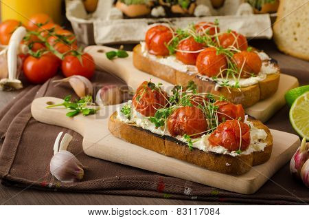 Roasted Cherry Tomato Sauce And Ricotta On Toast