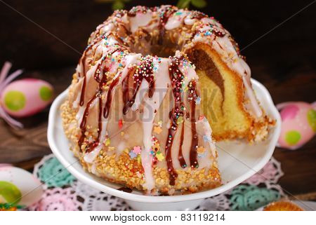 Easter Ring Cake With Icing And Colorful Sprinkles