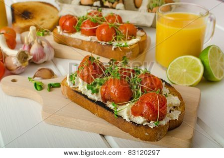 Roasted Cherry Tomato Sauce And Ricotta On Toast