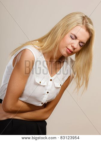Girl Suffering From Stomach Pain
