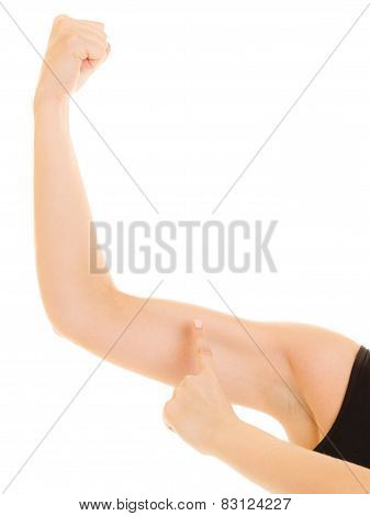 Fitness Woman Showing Energy Flexing Biceps Muscles.