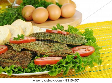 Omelet med dets ingredienser