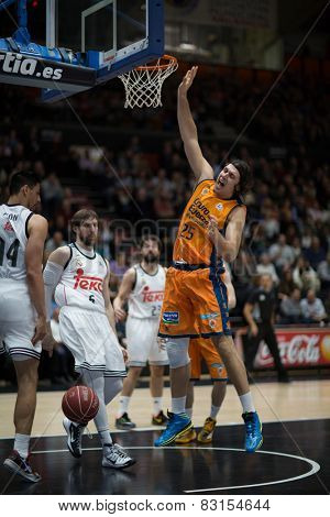 VALENCIA, SPAIN - FEBRUARY 15: Loncar 25 in action during Spanish League match between Valencia Basket Club and Real Madrid at Fonteta Stadium on February 15, 2015 in Valencia, Spain