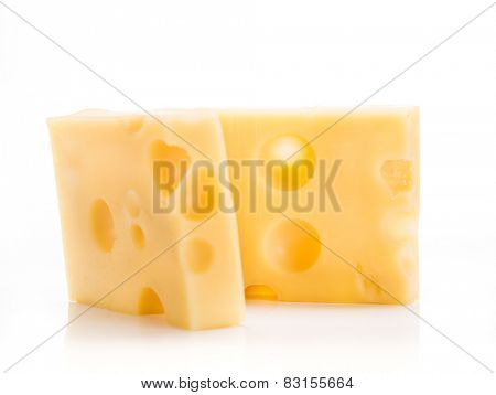 Piece of emmenthal cheese on white background, close-up.