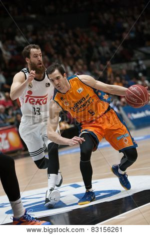 VALENCIA, SPAIN - FEBRUARY 15: Ribas with ball, Rodriguez during Spanish League match between Valencia Basket Club and Real Madrid at Fonteta Stadium on February 15, 2015 in Valencia, Spain
