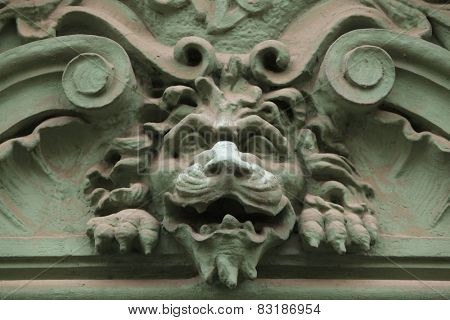 Lion head. Funny mascaron on the Art Nouveau building in Prague, Czech Republic.