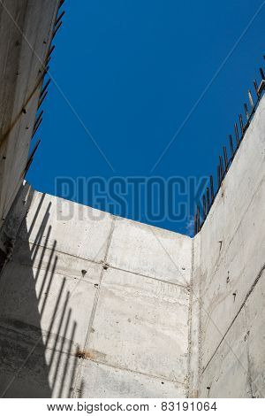 Grey Concrete Walls With Reinforcing Bars