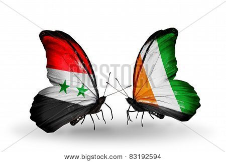 Two Butterflies With Flags On Wings As Symbol Of Relations Syria And Cote Divoire