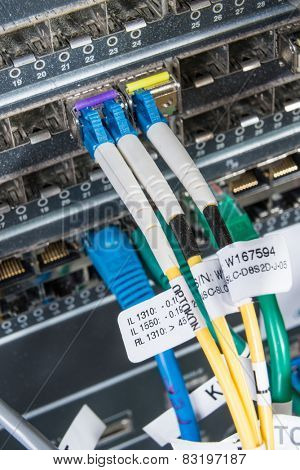 server with fiber optic  cables in data center